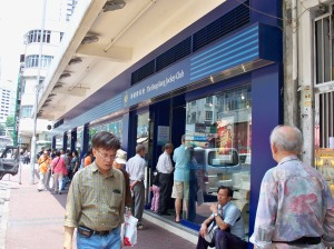 At Cheung Sha Wan station, people line up long before it opens